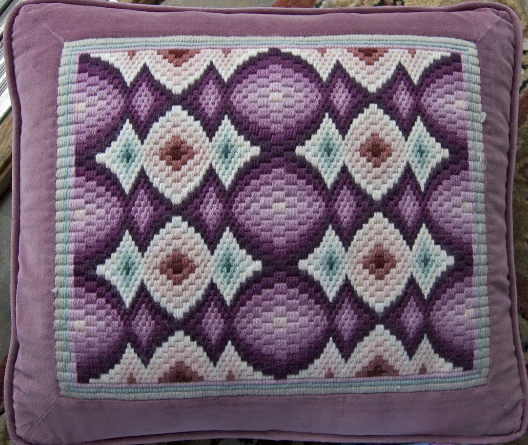 Bargello Pillow in Oval and Diamond pattern in Plums, Wood Roses, and Teals